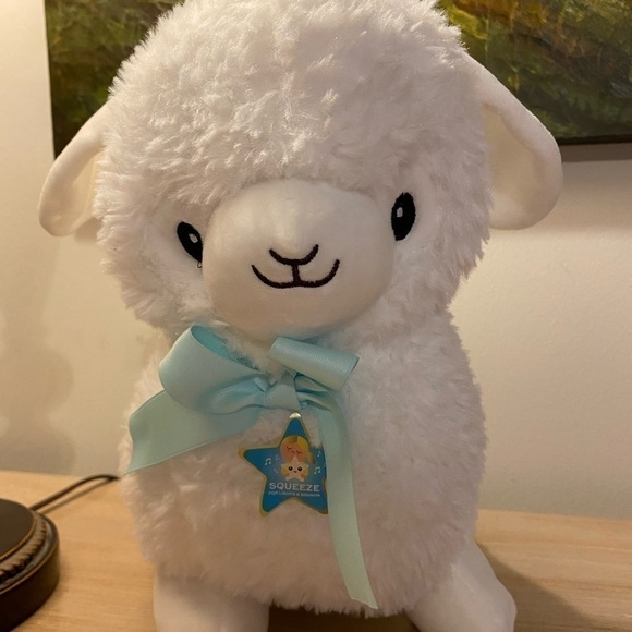 FAO Schwarz Other - Vintage white 15” lambFAO Schwarz! Furr white & soft. Blue lights so endearing.